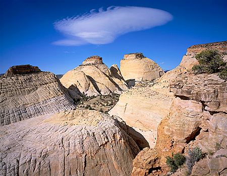 Large Golden Throne Navajo Sandstone Formations & Cloud
